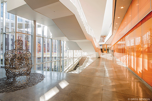 Sweeping stairways lead up to the cantilever base, punctuated by groupings of tables and chairs that Inquirer architecture critic Inga Saffron described as “nightclub-like lounges.”