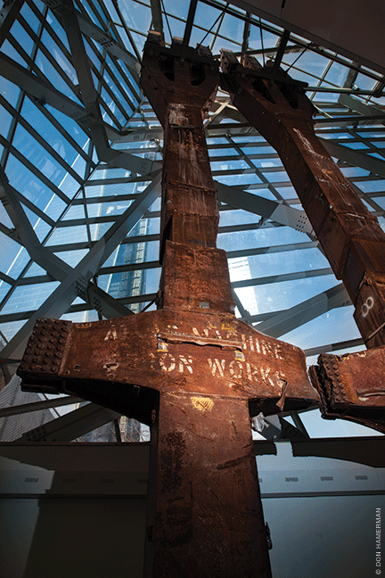 Twin Tower “tridents,” originally part of the building façade, stand in the museum’s atrium.