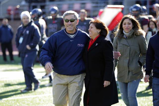 Bagnoli walks with his wife Maryellen during a pregame tribute to him Saturday.