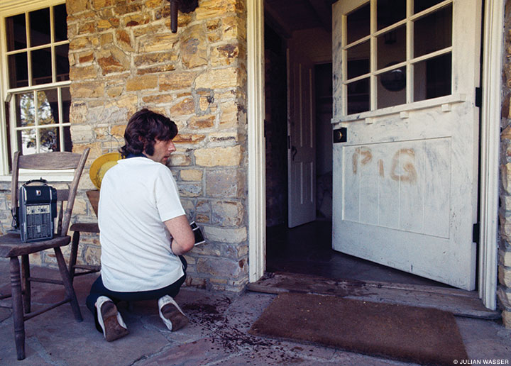 Roman Polanski outside his Cielo Drive home, days after the Manson Family murdered his wife, actress Sharon Tate (1969, Life).