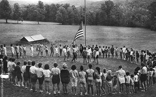 Saluting the flag.