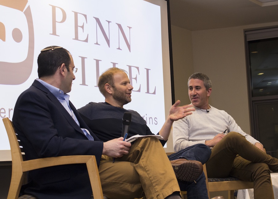 Rabbi Mike Uram, Steven Cook W’95, and Michael Solomonov sit on a panel discussion at Penn Hilell.