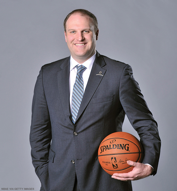 Photo of Taylor Jenkins holding a basketball