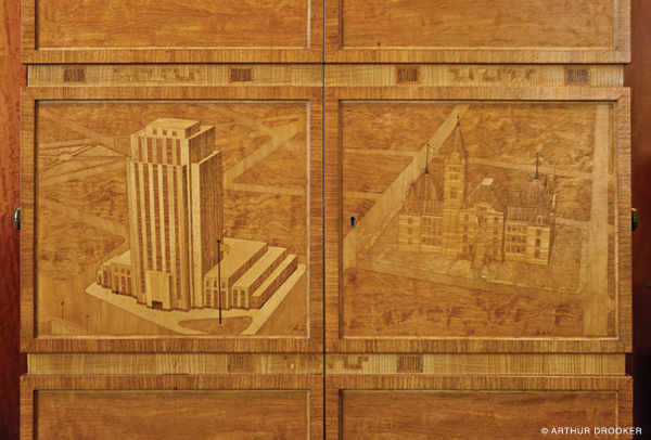 Cabinet depicting St. Paul City Halls, new and old. Photo by Arthur Drooker.