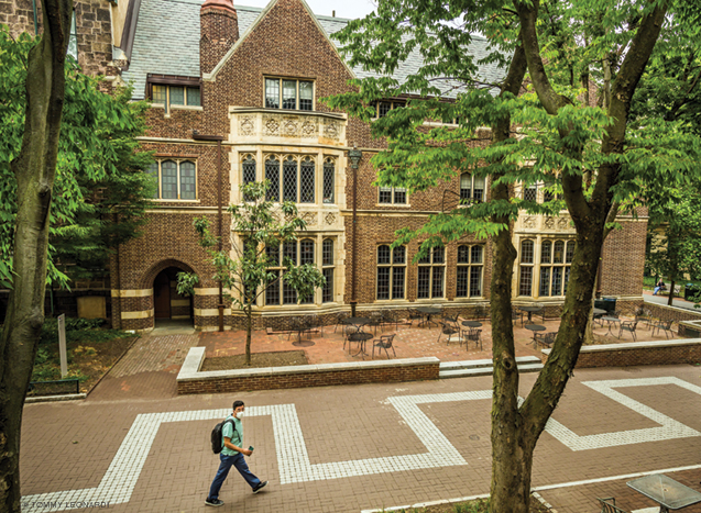 Photo of one student on Locust Walk.