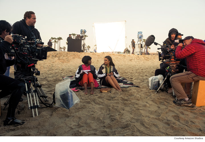 Photo of a beach scene during the making of Sylvie's Love.