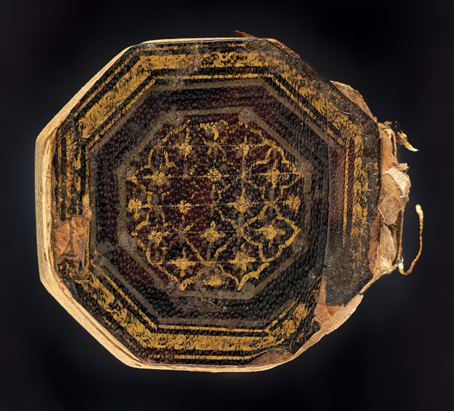 Miniature, octagonal Qurʼān, nearly complete, likely used as an amulet. The leaves were probably numbered when the copy was out of order; then it was rebound in the correct order, causing the foliation to be out of sequence. 1800.