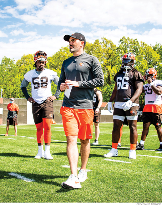 Photo of Stefanski on the field with players during 2021 training camp