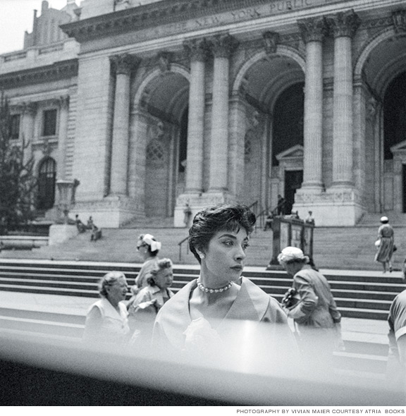 Photo of a woman in front of the library.