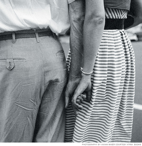 Photo of man and woman holding hands