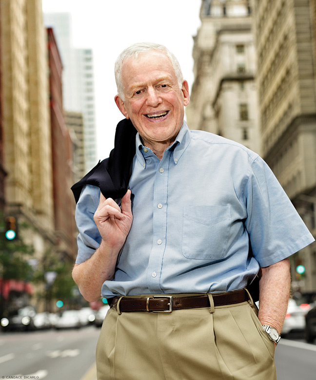 Photo of Dan Rottenberg standing in the middle of Broad Street, Center City Philadelphia